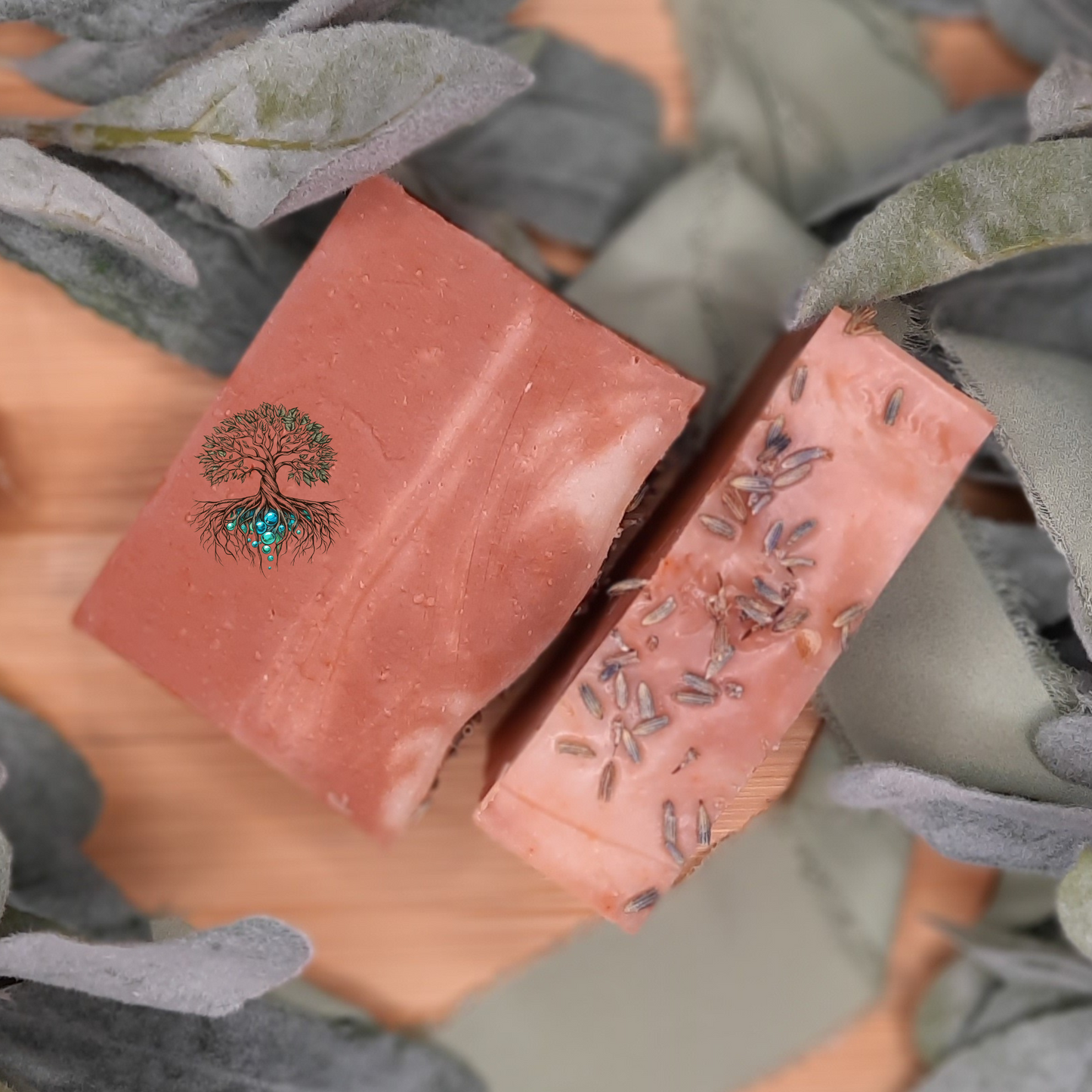 Light pink and darker pink swirls with dried lavender botanicals on top of the hemp soap bars.